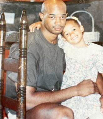 Young Cara Mia Wayans with her father.